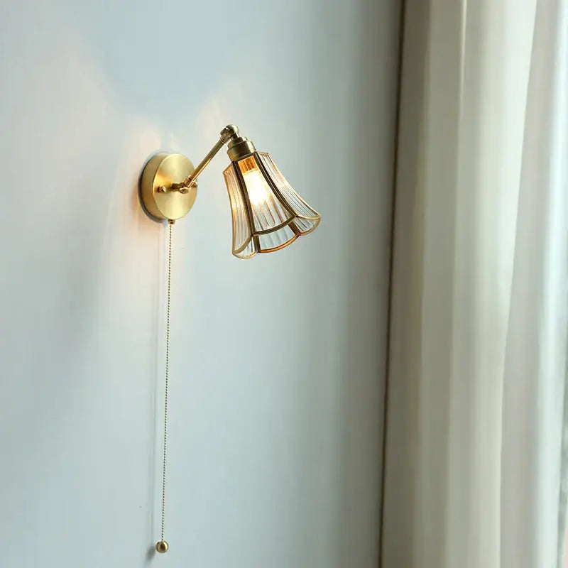 Brass-finished gold fluted glass wall sconce with adjustable arm ideal as decorbites copper wall lamp for bedroom