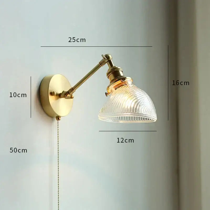Vintage-style brass wall sconce with gold fluted glass shade ideal as a bedroom wall lamp and decorbites copper wall decor