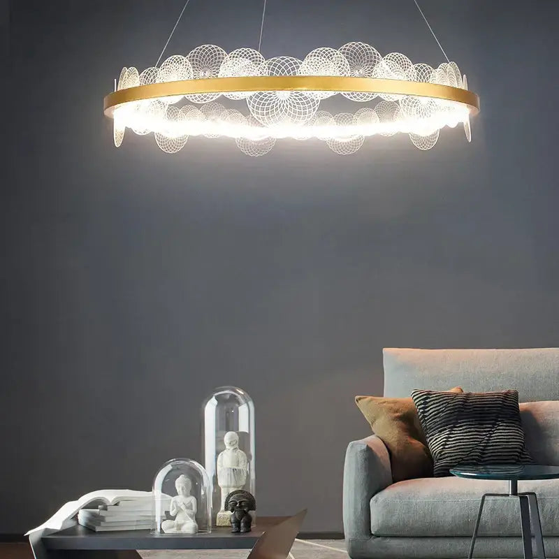 Gold-toned circular pendant light with intricate white mesh detailing featuring decorbites frost texture led design