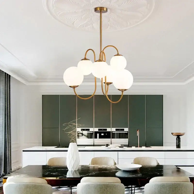 Gold-toned ball led pendant chandelier with five frosted glass balls for kitchen lighting by decorbites glass ball
