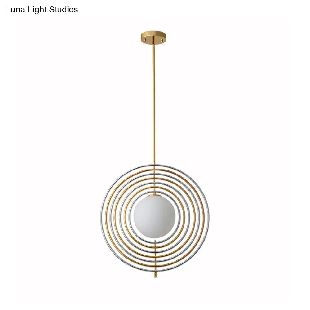 Gold Frosted Glass Orbit Pendant Light - Modern 1-Light Hanging Fixture for Dining Room with Concentric Rings