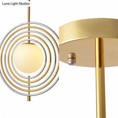 Gold Frosted Glass Orbit Pendant Light - Modern 1-Light Hanging Fixture for Dining Room with Concentric Rings