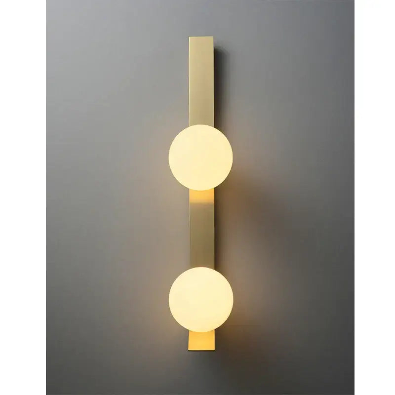 Modern gold-toned wall lamp with two spherical frosted glass shades for living room decorbites glass ball nordic style