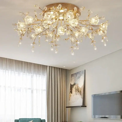Gold tonеd glass flower chandelier ceiling lamp with crystal branch design refracting light for living room use