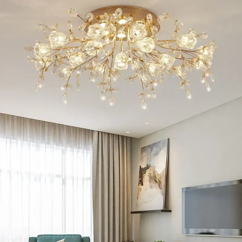 Gold tonеd glass flower chandelier ceiling lamp with crystal branch design refracting light for living room use