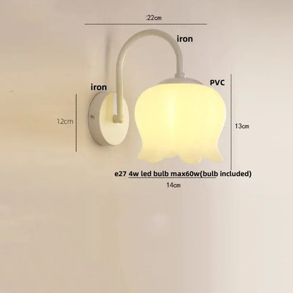 Gold iron led wall sconce with a soft yellow pvc tulip shade and curved iron arm for hallway decorbites iron led wall