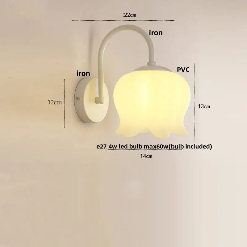 Gold iron led wall sconce with a soft yellow pvc tulip shade and curved iron arm for hallway decorbites iron led wall