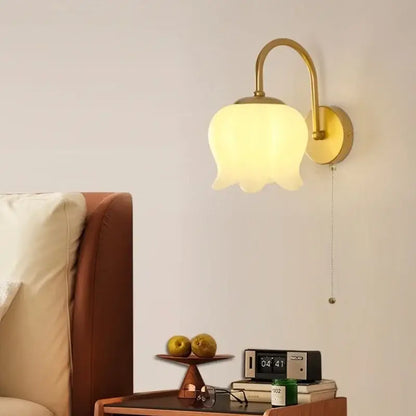 Gold iron led wall sconce with frosted glass tulip shade and pull chain for hallway decorbites iron led wall lighting