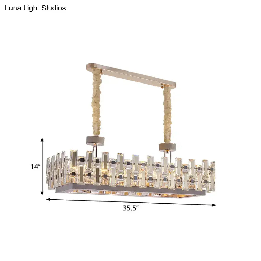 Decorbites™ 12-bulb gold island light with clear crystal blocks features a contemporary rectangular hanging lamp with metallic frame