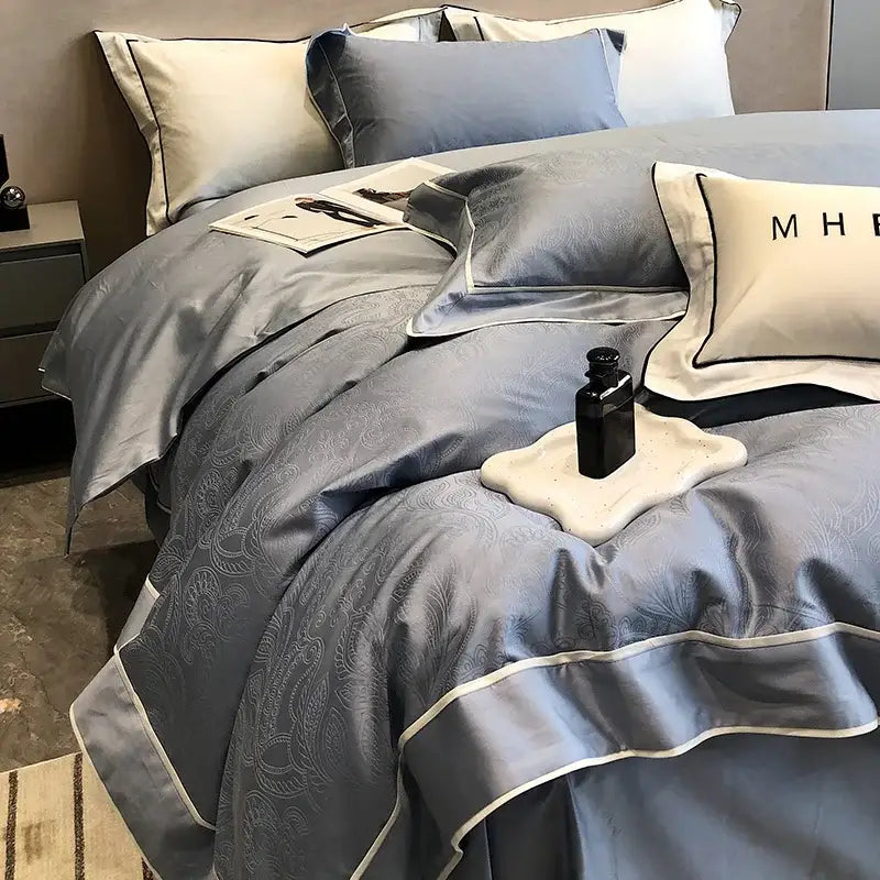 Elegant gray satin bedding set with paisley embroidery and white piping in decorbites jacquard satin egyptian cotton patchwork style