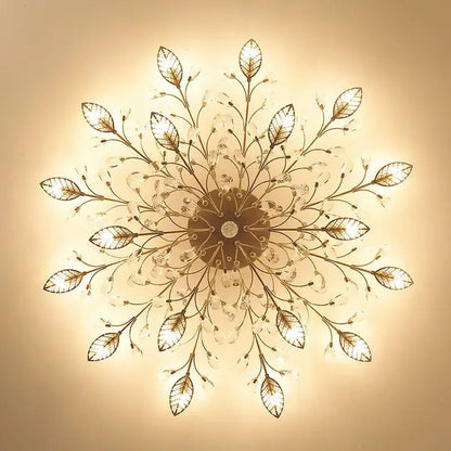 Gold-toned leaf-patterned ceiling chandelier led with crystal accents for living room decorbites crystal ceiling lighting