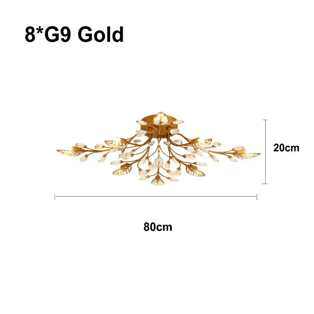 Gold-toned decorbites crystal ceiling chandelier with intricate leaf design and eight g9 bulbs for living room use