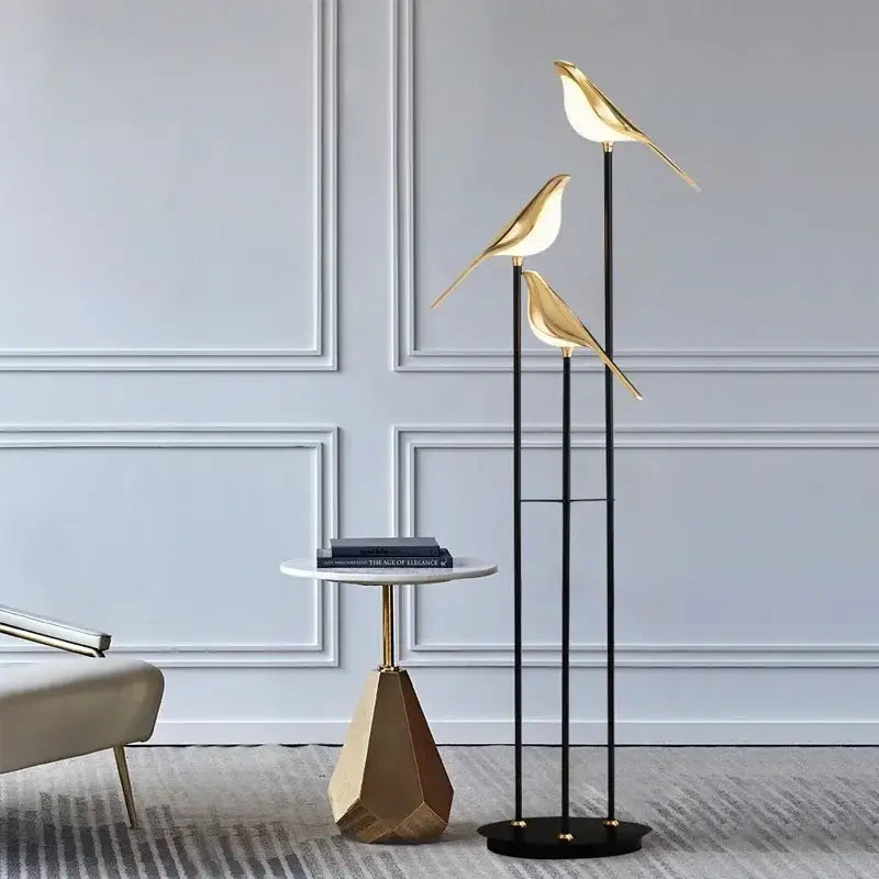 Gold led bird desk lamp with sleek modern design and illuminated figures on black poles for bedroom and living room decorbites led bird