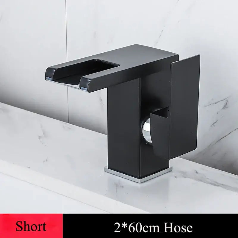 Black matte basin faucet with sleek rectangular spout and square base for decorbites led waterfall basin use