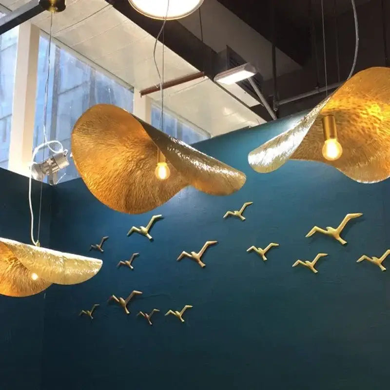 Gold lotus leaf led chandelier features golden textured pendant lights with warm glowing bulbs for living room dining kitchen island decorbites gold lotus