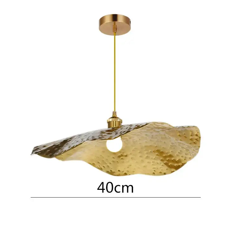 Gold-toned hammered metal pendant light with lotus leaf shape and central bulb for living room decor decorbites gold lotus