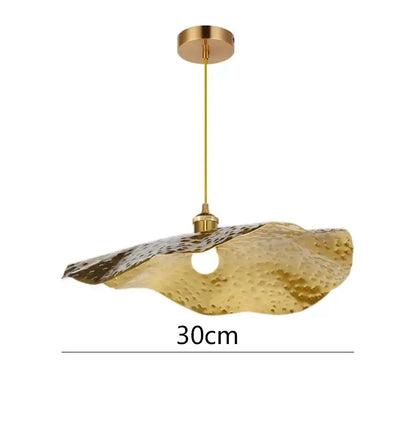 Gold-toned hammered metal pendant light with a lotus leaf shape and textured surface for decorbites gold lotus decor