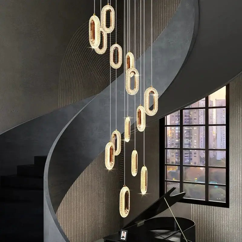 Gold lustre oval acrylic chandelier with sparkling textured surface and sleek metallic finish for dining room decorbites gold lustre