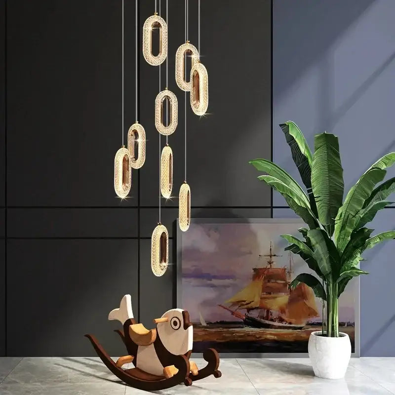 Modern gold-toned decorbites gold lustre oval acrylic chandelier pendant lights with crystal embellishments for dining room decor