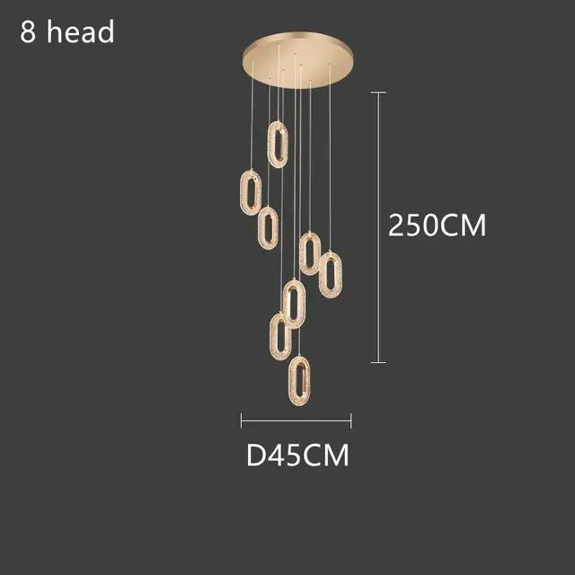 Gold-toned lustre oval acrylic chandelier with eight oval led lights suspended from circular ceiling mount by decorbites gold lustre