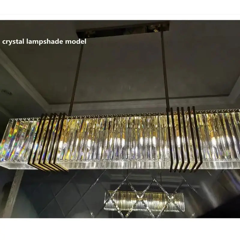 Gold lustre steel pendant light with vertical faceted glass rods and gold-toned metal accents for dining room decorbites gold lustre