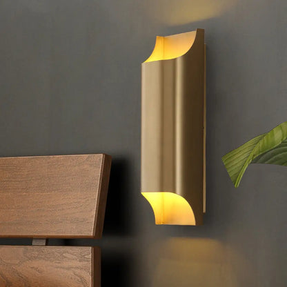 DecorBites™ Gold Metal LED Wall Light with Modern Cut Geometry – Ideal for Bedside Ambiance