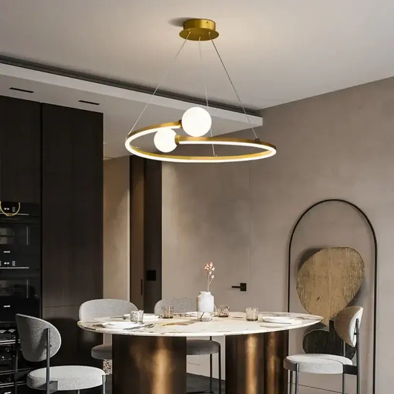 Modern gold nordic ring led chandelier featuring two white glass bulbs suspended by thin cords for dining room decorbites gold nordic