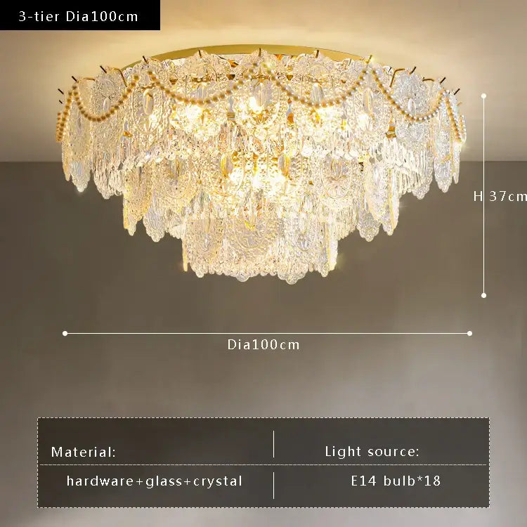A luxurious gold pearl pendant chandelier with three tiers of crystal leaf decor and 18 e14 bulbs by decorbites gold pearl