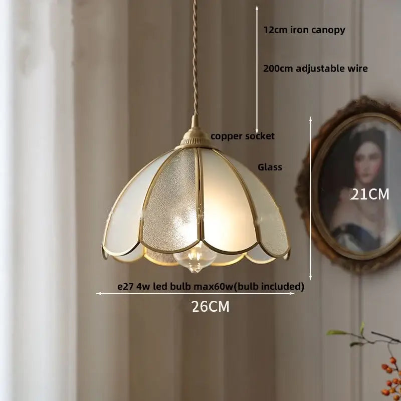 Gold petal glass led pendant lamp with brass frame and frosted glass panels in a vintage kitchen lighting fixture