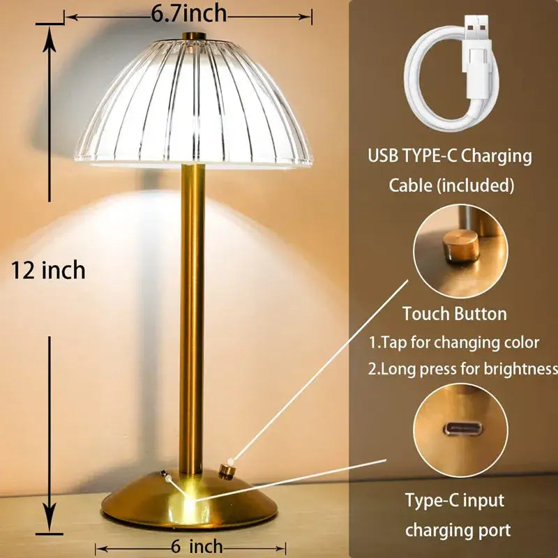Gold-toned table lamp with a clear ribbed glass dome shade and diamond touch sensor led for bedroom lighting