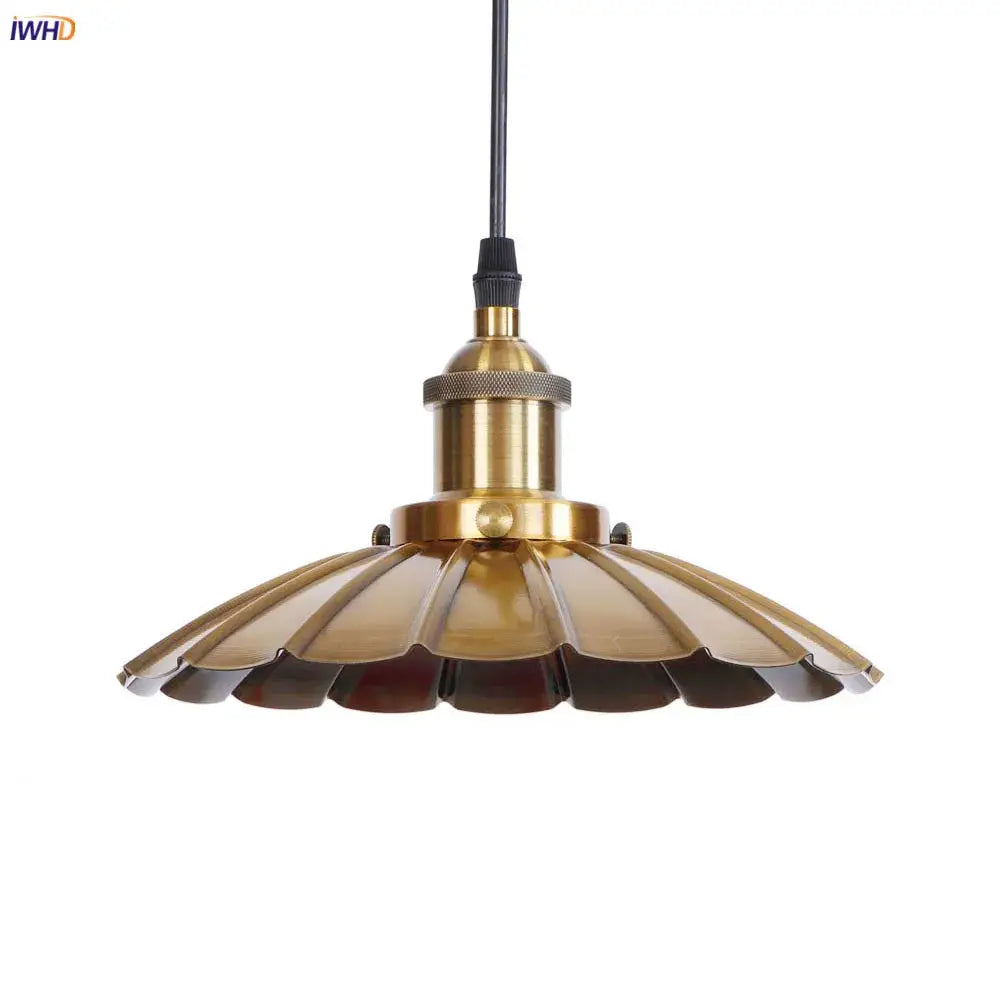 Brass-colored fluted pendant lights with gold retro edison design for dining room decor by decorbites