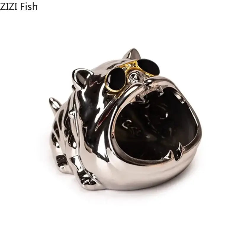 Silver tiger shaped ashtray with black onyx eyes and gold rimmed sunglasses from decorbites bulldog ceramic office decor