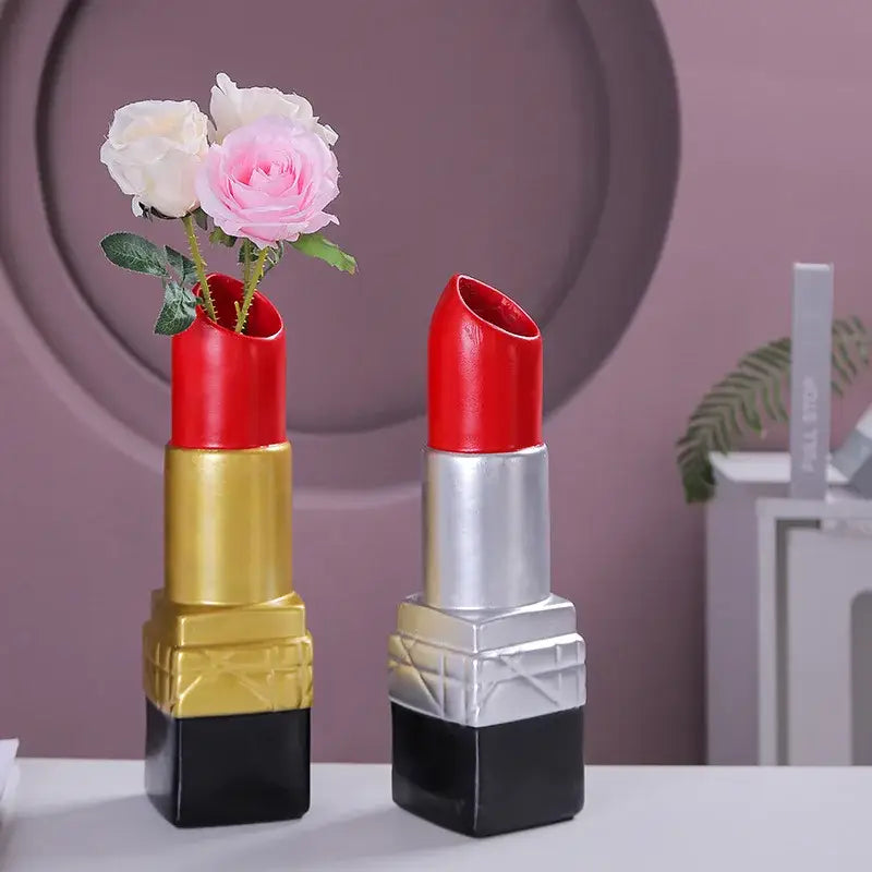 Two resin decorbites lipstick vases in gold black and silver black colors with pink and white roses for bedroom decor