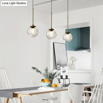 Gold Sphere Hanging Light with Water Glass Shade - Modern Ceiling Suspension Lamp