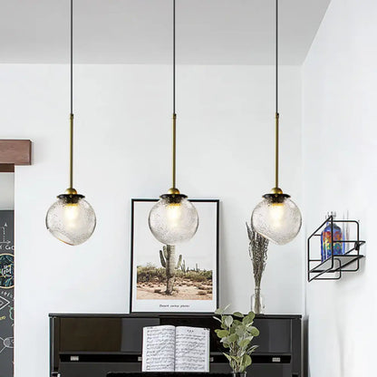 Gold Sphere Hanging Light with Water Glass Shade - Modern Ceiling Suspension Lamp