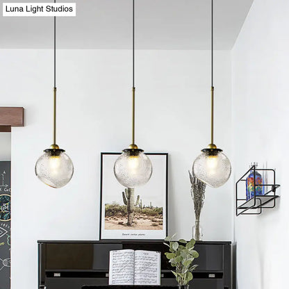 Gold Sphere Hanging Light with Water Glass Shade - Modern Ceiling Suspension Lamp