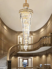 Gold stainless steel crystal pendant light with cascading clear glass prisms and gold frame for living room decorbites