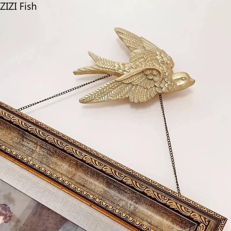 Gold swallow dove wall hanging hooks with detailed feather texture and chain for mounting decorbites dove wall decor