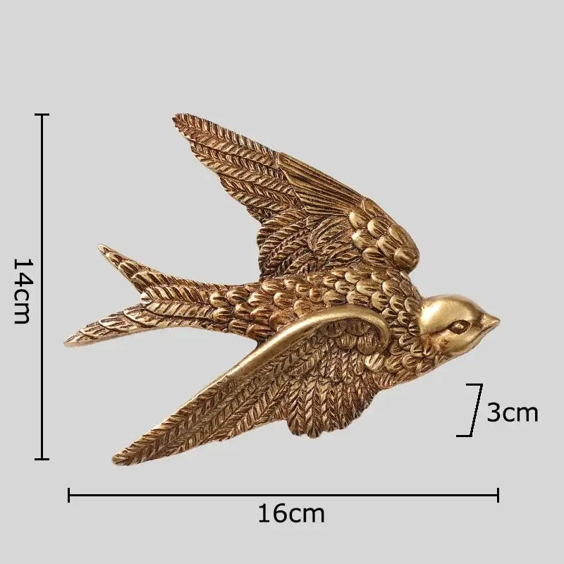 Golden swallow dove wall hanging hooks with detailed feather textures and metallic finish for living room decorbites dove wall