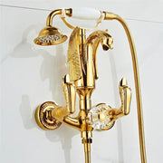 Gold swan bathtub faucet set with gold-finished swan design, crystal knob, and white ceramic handle by decorbites