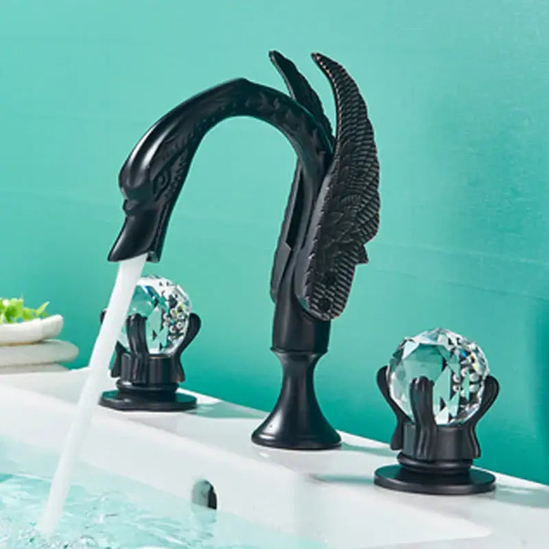 Black swan-themed bathroom faucet with gold swan crystal knobs by decorbites for elegant basin mixer tap use