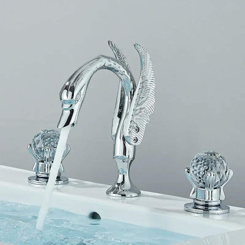 Chrome-finished decorbites gold swan bathroom faucet with gold swan crystal handles and feathered wing details