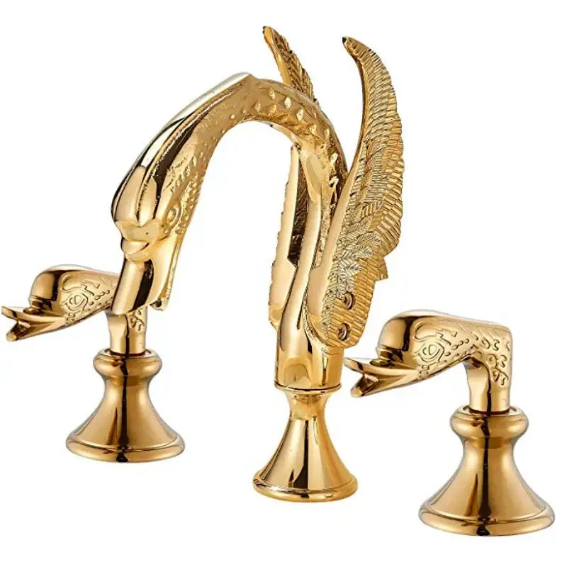 Golden ornate bathroom faucet with decorbites gold swan crystal handles featuring detailed swan and feather patterns