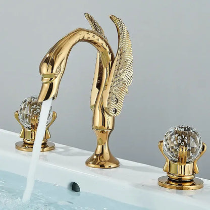 Gold swan crystal handle bathroom faucet with intricate feather detailing and crystal knobs by decorbites gold swan