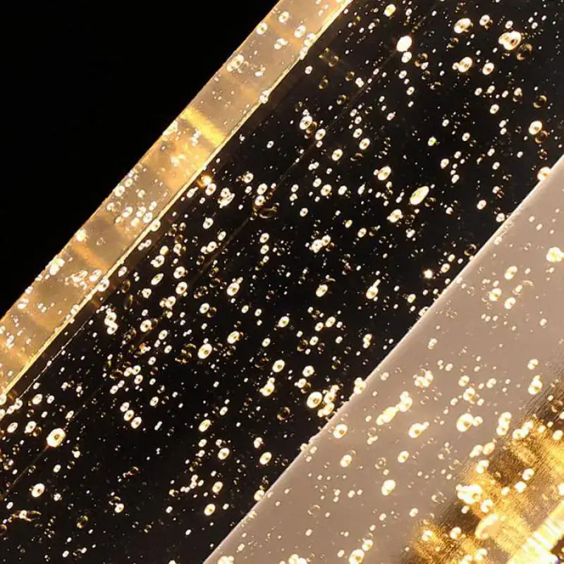 Gold textured decorbites bubble glass led wall lamp featuring a sparkling champagne flute design for bedroom sconce decor