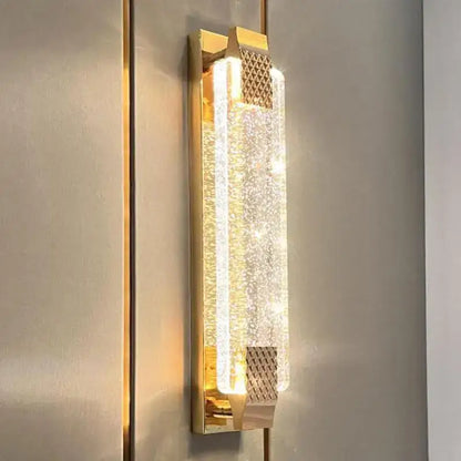 Gold textured bubble glass led wall lamp with crystal-like panel emitting warm light for bedroom decorbites bubble glass