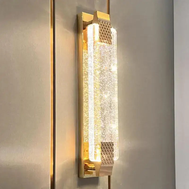 Gold textured bubble glass led wall lamp with crystal-like panel emitting warm light for bedroom decorbites bubble glass