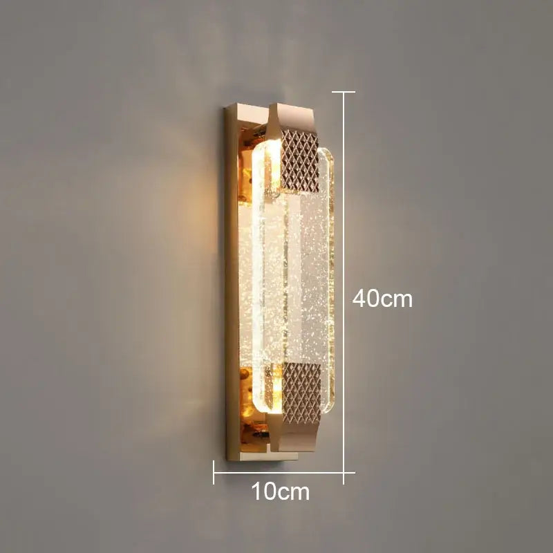 Modern gold finished wall lamp with decorbites bubble glass textured crystal panel and illuminated led strip for bedroom decor