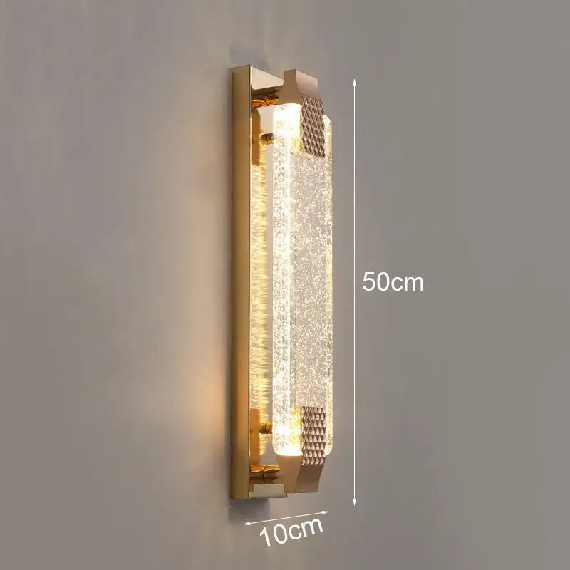 Gold wall lamp with textured bubble glass led panel and geometric metal accents for bedroom decorbites bubble glass