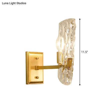 DecorBites™ DecorBites™ Gold Wall Lamp: Curved Postmodern Design with Clear Hammered Glass - Ideal for Foyer